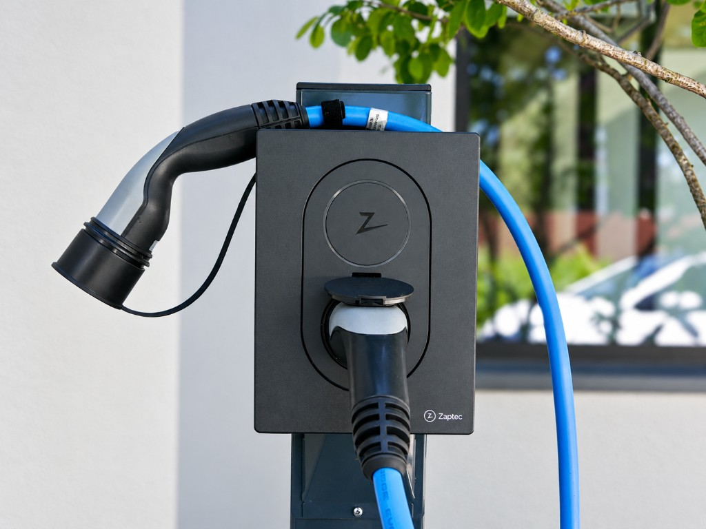 Zaptec EV charger with charging cable on the wall
