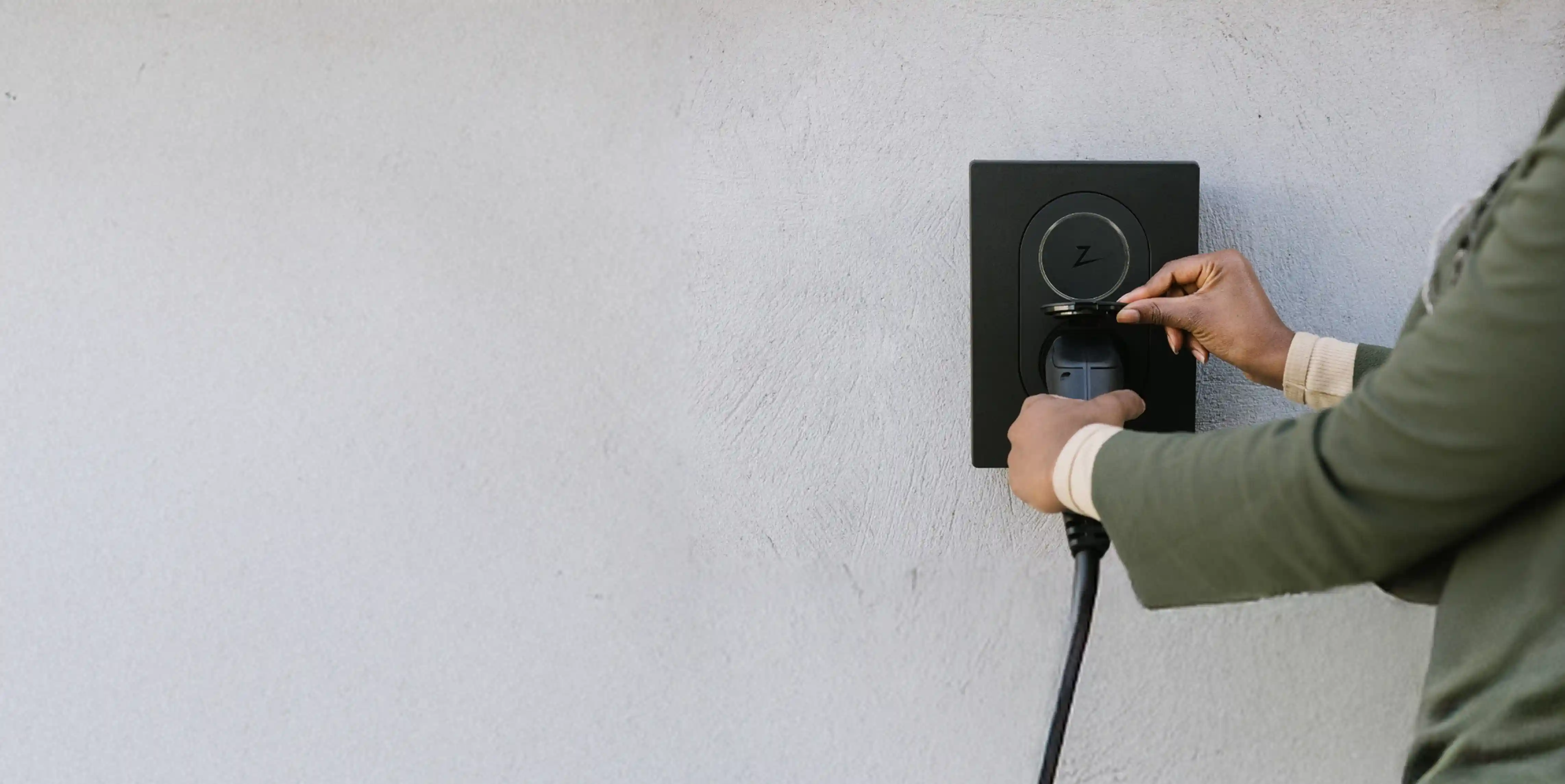 Zaptec EV charger mounted on the exterior of a home